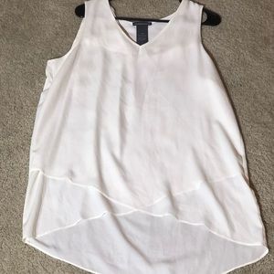 Sheer overlay v-neck blouse. Lower on back - L